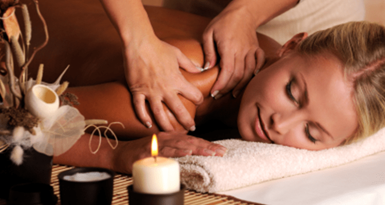 A woman receiving Aromatherapy and Massage