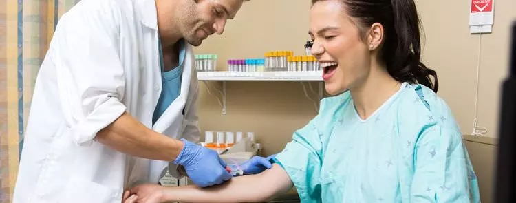 A Phlebotomist drawing blood