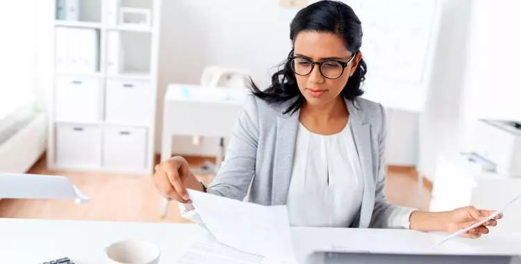 A Medical Administrative Assistant working-at-her-desk