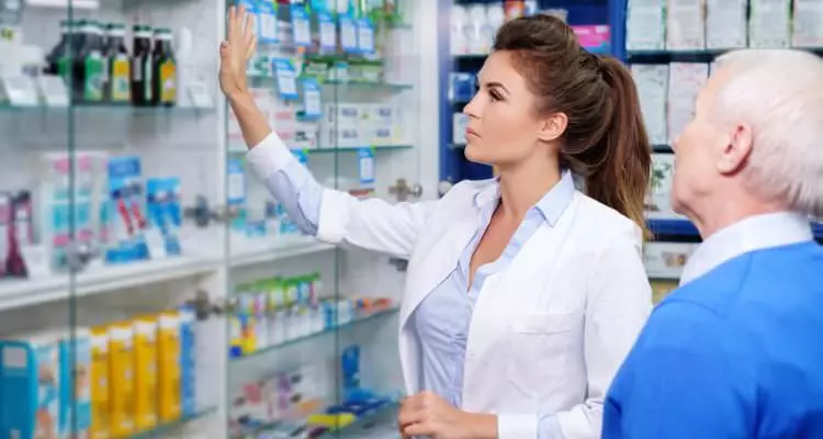 Pharmacy technician woman employee
