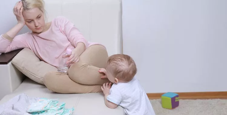 Postpartum Depression mother with her child