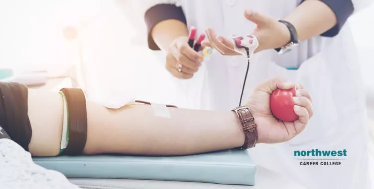 A man donating blood .
