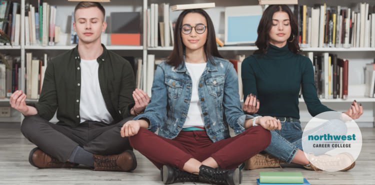 Students balance books on their head and sitting down cross-legged signifying that they are relaxed because they know how to deal with stress.