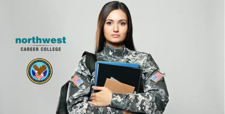 A female veteran with books in her arms standing proud.