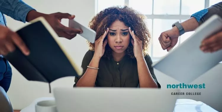 A female student getting being stressed about how she will handle multiple things.