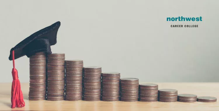 Piles of coins with graduation cap on last row with an increased ascension indicating long-term savings.