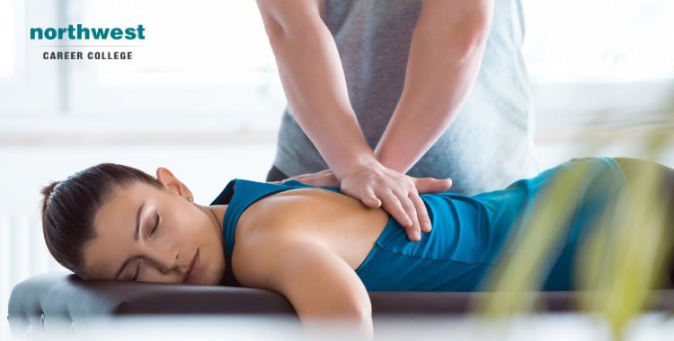 therapist massaging a woman