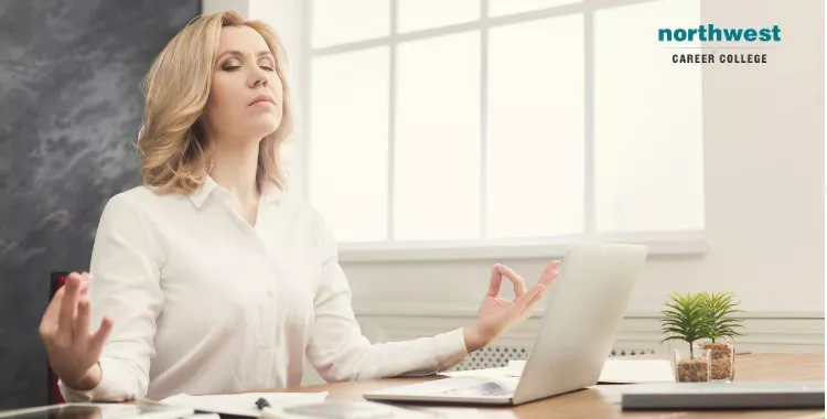 woman doing yoga at workplace