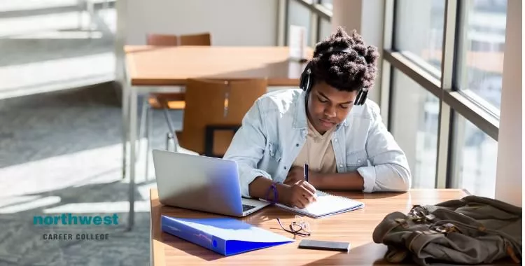 student studies in library