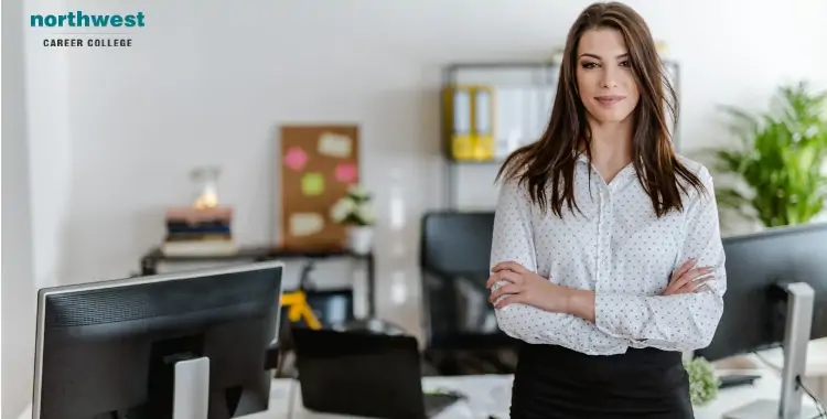 Confident woman in an office setting, representing Business Administration at Northwest Career College.