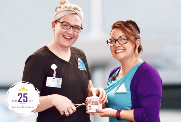 Two smiling women in a trade school setting, showcasing skills at an Award Winning Trade School.