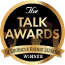 Logo of The Talk Awards, featuring Winner and emphasizing excellence in customer satisfaction.