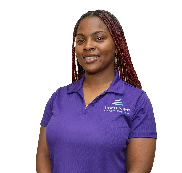Smiling student in a purple shirt representing Northwest Career College, promoting the medical billing coding diploma.