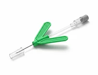 A butterfly needle with green wings and a clear tube, used for blood draws or IV access.