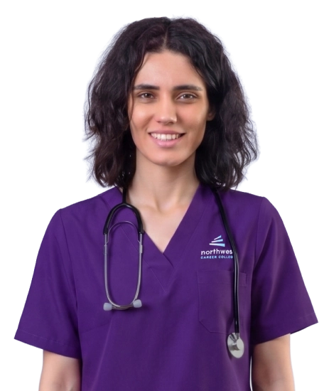 Female mammography student in purple scrubs at Northwest Career College